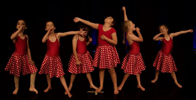 Children from Lakes Theatre Arts on stage at Queenstown Memorial Centre